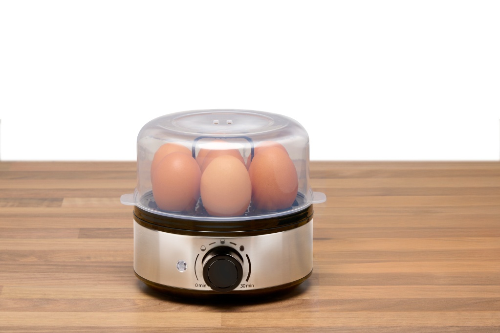 ALPINA Egg Cooker 400W Silver on table.jpg